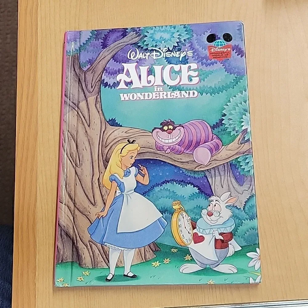 Alice in Wonderland 1 vhs 1 dvd movie, 1 book, Happy‎ Meal Toy, Stickers, Pin